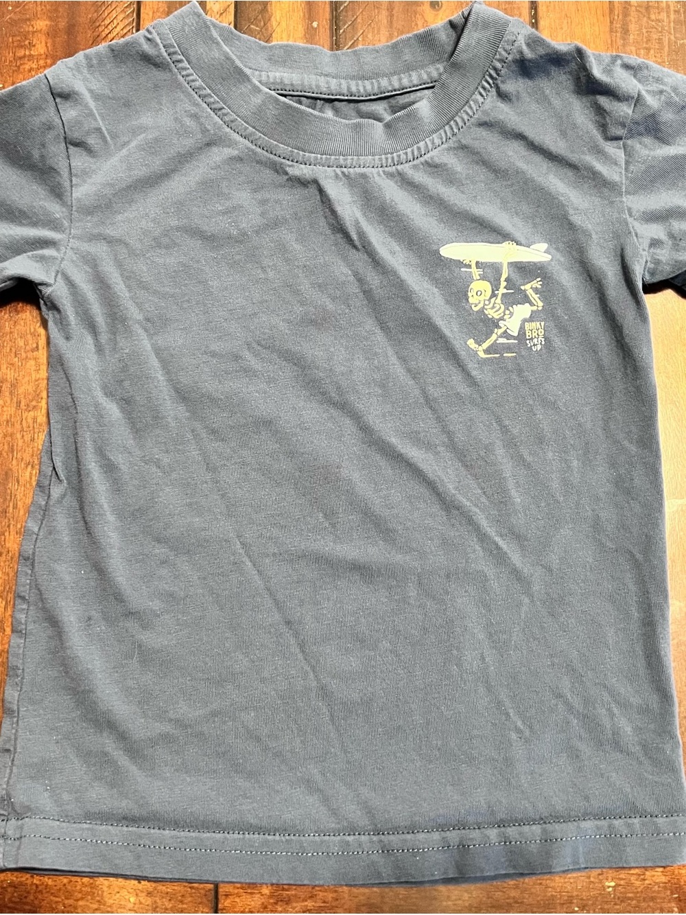 Kids Short Sleeve Tee in Navy with Surf Skeleton Graphic